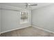 Well-lit bedroom with a ceiling fan and window at 771 Jordan Ln # F, Decatur, GA 30033