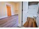 Updated bathroom with shower and toilet, featuring wood-look flooring at 3 Bay St, Covington, GA 30014