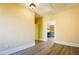 Bright dining room with wood-look floors and access to the kitchen at 3 Bay St, Covington, GA 30014