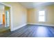 Spacious living room with hardwood floors and neutral walls at 3 Bay St, Covington, GA 30014