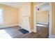 Living room with hardwood floors and fireplace at 3 Bay St, Covington, GA 30014