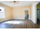 Living room with hardwood floors and access to other rooms at 3 Bay St, Covington, GA 30014