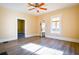 Living room featuring hardwood floors, lots of natural light and ceiling fan at 3 Bay St, Covington, GA 30014