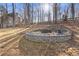 Charming fire pit area perfect for gatherings at 610 Lovinggood Trl, Woodstock, GA 30189