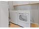 Bright laundry room with washer and dryer at 610 Lovinggood Trl, Woodstock, GA 30189