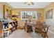 Home office with wood desk and built-in shelves at 610 Lovinggood Trl, Woodstock, GA 30189