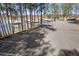 Parking area with lake and marina views at 610 Lovinggood Trl, Woodstock, GA 30189