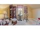 Cozy sitting area with a window and wooden shelving at 610 Lovinggood Trl, Woodstock, GA 30189