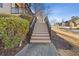 Exterior stairs leading to the front entrance at 610 Lovinggood Trl, Woodstock, GA 30189