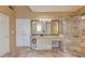 Spacious bathroom with a glass enclosed walk-in shower and white cabinets at 1095 Whitehawk Trl, Lawrenceville, GA 30043