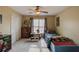 Bedroom with carpet, window, fan and closet at 1095 Whitehawk Trl, Lawrenceville, GA 30043