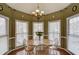 Bright breakfast nook featuring charming lighting, and large windows offering ample natural light and a cozy feel at 1095 Whitehawk Trl, Lawrenceville, GA 30043