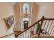 High angle view of foyer, with hardwood floors, chandelier, and staircase at 1095 Whitehawk Trl, Lawrenceville, GA 30043