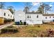 Cozy home's backyard with green bins and direct access to the house, a great feature for easy outdoor living at 1380 Westmont Sw Rd, Atlanta, GA 30311