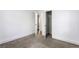 Bedroom with carpet, base molding, white walls, and closet space at 1380 Westmont Sw Rd, Atlanta, GA 30311