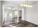 Bright living area with hardwood floors, recessed lighting, and large glass doors at 1380 Westmont Sw Rd, Atlanta, GA 30311