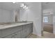 Bathroom with double vanity and granite countertop at 4131 Fulson Dr, Lilburn, GA 30047