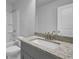 Bathroom with granite countertop and modern vanity at 4131 Fulson Dr, Lilburn, GA 30047