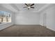 Large bedroom featuring a ceiling fan and large window at 4131 Fulson Dr, Lilburn, GA 30047