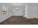 Simple dining room with hardwood floors and a view to the backyard at 4131 Fulson Dr, Lilburn, GA 30047