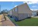 Townhouse rear elevation showcasing brick and siding at 4131 Fulson Dr, Lilburn, GA 30047