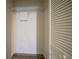 Closet featuring overhead storage, an adjustable shelf, and adjustable closet door slats at 1119 Summer Brook Rd, Atlanta, GA 30349