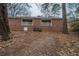 Brick building with two upper balconies surrounded by trees at 1119 Summer Brook Rd, Atlanta, GA 30349