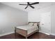 Bright bedroom featuring hardwood floors and a ceiling fan at 1364 Almont Sw Dr, Atlanta, GA 30310