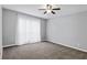 Spacious bedroom with ceiling fan and neutral gray walls at 2657 Lenox Ne Rd # 134-2, Atlanta, GA 30324