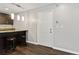 Interior entryway with dark wood floors and kitchen island at 2657 Lenox Ne Rd # 134-2, Atlanta, GA 30324