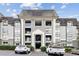 Charming condo building with exterior architectural detail and front parking at 2657 Lenox Ne Rd # 134-2, Atlanta, GA 30324