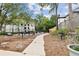 Community grilling area with a walking path and lush landscaping at 2657 Lenox Ne Rd # 134-2, Atlanta, GA 30324