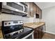 Modern kitchen with stainless steel appliances and granite countertops at 2657 Lenox Ne Rd # 134-2, Atlanta, GA 30324