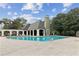 Refreshing swimming pool with a pool house and surrounding lounge chairs at 2657 Lenox Ne Rd # 134-2, Atlanta, GA 30324