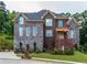Stunning brick home with multi-level design and landscaping at 2914 Battlecrest Dr, Decatur, GA 30034