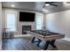 Game room with pool table, fireplace, and hardwood floors at 2914 Battlecrest Dr, Decatur, GA 30034