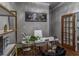 Home office with marble desk, gold accents, and hardwood floors at 2914 Battlecrest Dr, Decatur, GA 30034