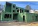 Two-story modern home construction featuring Zip System sheathing and exposed framing at 3534 Rockhaven Ne Cir, Atlanta, GA 30324