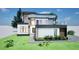 Contemporary two-story home with a rooftop terrace, large windows, and modern design at 3534 Rockhaven Ne Cir, Atlanta, GA 30324