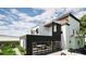 Contemporary home rendering featuring a rooftop deck, modern garage doors, and sleek design at 3534 Rockhaven Ne Cir, Atlanta, GA 30324