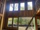 Framing of a new home with tall windows for natural light and nature views at 3534 Rockhaven Ne Cir, Atlanta, GA 30324