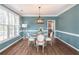 Dining room featuring ample natural light, elegant chandelier, and modern decor at 2107 Kendall Close Nw, Acworth, GA 30102