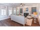 Bright living room with built-in bookcases, a fireplace, and neutral decor at 2107 Kendall Close Nw, Acworth, GA 30102