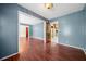 Dining area with hardwood floors and access to the kitchen at 241 W Simon Nw Ter, Atlanta, GA 30318