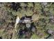 Aerial view showing home's setting and driveway at 265 Forest Lakes Dr, Covington, GA 30016