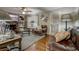 Cozy living room featuring hardwood floors and a fireplace at 265 Forest Lakes Dr, Covington, GA 30016