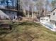 Large backyard with shed and wooded area at 3566 Carry Ct, Snellville, GA 30039