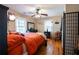 Bright bedroom with hardwood floors, ceiling fan, and plenty of natural light at 953 Garibaldi Sw St, Atlanta, GA 30310