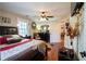 Comfortable bedroom featuring a ceiling fan and hardwood flooring at 953 Garibaldi Sw St, Atlanta, GA 30310