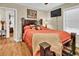 Spacious bedroom with hardwood floors and access to another room at 953 Garibaldi Sw St, Atlanta, GA 30310